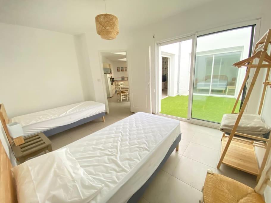 Le Patio Plain-pied Face Port *