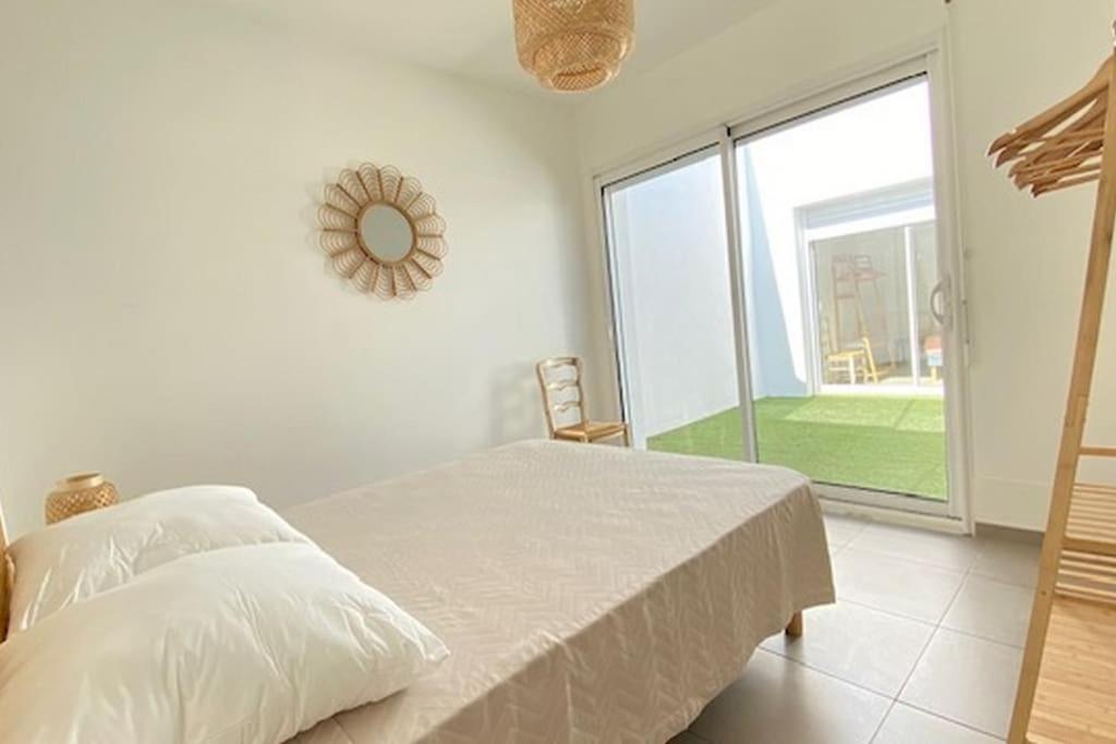 Le Patio Plain-pied Face Port